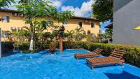 Apartamento 2 quartos com ar condicionado e piscina, há 3 min a pé da praia de taperapuan-300 mts - Chambres d'hôtes Porto Seguro