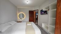 Apartamento 2 quartos com ar condicionado e piscina, há 3 min a pé da praia de taperapuan-300 mts - B&B Porto Seguro