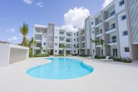 Stylish 1BR Laguna Beach Walk to Dominicus Beach - Chambres d'hôtes Dominica