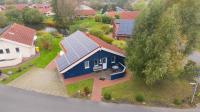 6 Personen Ferienhaus in direkter Seelage mit Bootsteg und Kanu sowie Sauna, Whirlpool und Kaminofen in Otterndorf - Chambres d'hôtes Otterndorf