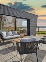 FUTOPIA Strandhäuser mit Seeblick, Sauna & Hot Tub - Ferienwohnung Buschmühle