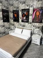 Ексклюзивні апартаменти " VINYL HOUSE" на центральному проспекті, програвач вінілу з платівками, великий Smart TV,преміум-підписки YouTube та онлайн-кінотеатрів , кавомашина, відкритий балкон, ЗВІТНІ ДОКУМЕНТИ - B&B Kryvyi Rih