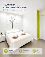 Modern Apartment in Jesolo with Terrace and Parking near Beach - Chambres d'hôtes Lido di Jesolo