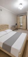 Turkistan City Apartment - Chambres d'hôtes Türkistan