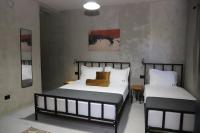 Chambre Triple avec Balcon