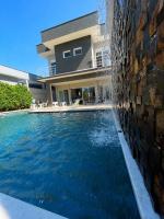 Morada Sun House 4 Suítes com Sacadas, Piscina Privativa com Cascata e área gourmet - Ferienwohnung Bertioga