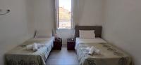 Tweepersoonskamer met 2 Aparte Bedden