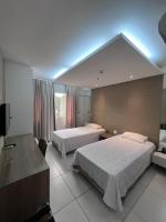 Quarto no Hilton Garden - Piscina - Academia - Ar-condicionado - Região Nobre - Andar alto - Chambres d'hôtes Belo Horizonte