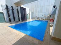 Stylish Studio in Giovanni Suites Dubai Sports City - Chambres d'hôtes Dubaï