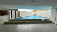 Cozy Suite near Cebu Business Park with City View Balcony, Pool, Netflix-Ready Smart TV - Chambres d'hôtes Cebu