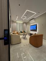 غرفة و صالة الحمراء - One bedroom and a living room - B&B Al ‘Azīzīyah