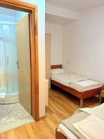 Tweepersoonskamer met 2 Aparte Bedden