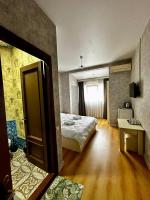 Dreibettzimmer mit Badewanne