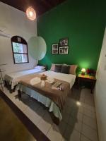 Dreibettzimmer mit Gartenblick