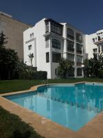 Charming Apartment with Balcony, Pool, Parking, and 2700m2 Garden - Ferienwohnung Oued Laou