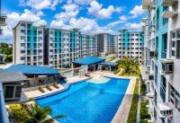 Davao Condo 2BR at Seawind With Netflix Fast Wi-Fi & Backup Wifi Near Airport and & Samal Island Ferry - Chambres d'hôtes Davao