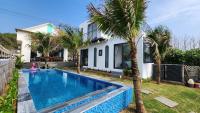 Oceanfront Escape 5BR Pool & BBQ Garden - Chambres d'hôtes Tân Thuận
