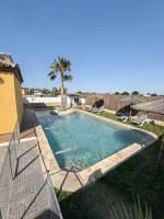 Chalet con piscina privada Lugar tranquilo con Palmeras - B&B Chiclana