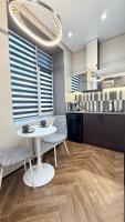 Вид на набережную , две уютных студии рядом с центром - B&B Pavlodar