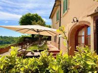 Casetta Luna e Sole Vista Colline Toscane WiFi Ultra Giardino e Ricarica EV - B&B Montescudaio