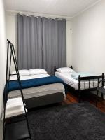Habitación Triple Básica con baño compartido