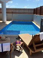JoLi Beach Apartments with Shared Pool - Chambres d'hôtes Santa Maria