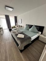 Modern Seeblick Balkon 2 Min zur Gondel - B&B Goslar