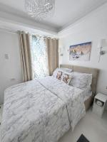 Snuggle's Nest Tanza Condo - Chambres d'hôtes Punta