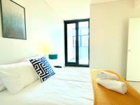 Three-Bedroom Apartment with Water View