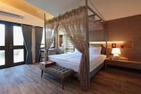 Zimmer mit Queensize-Bett und Gartenblick