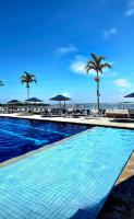 Apartamento no condomínio Golden Lake - Lagoa privativa - 06 hóspedes - AR e Wi-Fi - Bed and Breakfast Arraial do Cabo