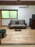 Habitación Familiar Deluxe con baño compartido