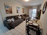 Apto 1 dorm quadra da praia, wi-fi, pet friendly e garagem - B&B Praia Grande