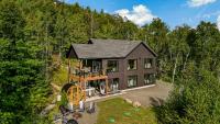 Vertigo-Chalet-Fleuve-Montagnes-Spa Sauna - B&B Les Éboulements