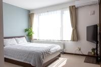 Tweepersoonskamer met Gedeelde Badkamer