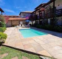 Casa térrea em condomínio à 450m da praia do Peró - B&B Cabo Frio