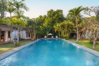 Agung Wiwin Homestay & Restaurant - Chambres d'hôtes Canggu