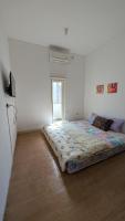 Chambre Triple avec Salle de Bains Commune