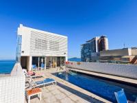 ao lado da praia com frigobar microondas e mais - Bed and Breakfast Santos