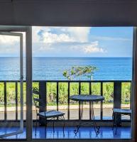 Habitación Cuádruple Deluxe con vistas al mar