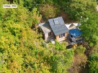 Henrys Tiny Houses - Cottage INGE oder Bungalow REGINA mit Glamping Zelt im Sommer - ruhig, Garten, Talblick, Natur - B&B Würzburg