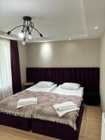 Chambre Double ou Lits Jumeaux Deluxe – Vue sur Jardin