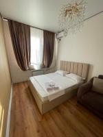Апартаменты в ЖК Tandau - Chambres d'hôtes Almaty