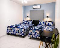 Evolution Home Habitación Familiar a 4 min Aeropuerto de El Salvador - B&B Las Flores