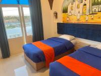 Doppelzimmer mit Balkon (2 Erwachsene + 1 Kind)
