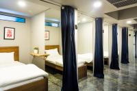 Single Bed in Dormitory Room