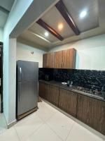 Nestay Comfy 2 Bhk-Cozy Style & Comfort - Chambres d'hôtes Islamabad