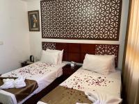 Deluxe Tweepersoonskamer met 1 of 2 Bedden
