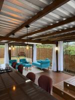 Deck com hidromassagem junto à natureza - B&B São Francisco de Paula