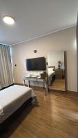 Novo Quarto com varanda, Moderno e Aconchegante no centro da cidade - B&B Lavras